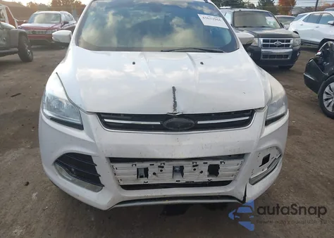 2015 Ford Escape Titanium z USA, uszkodzony, nr VIN 1FMCU0J93FUB60403